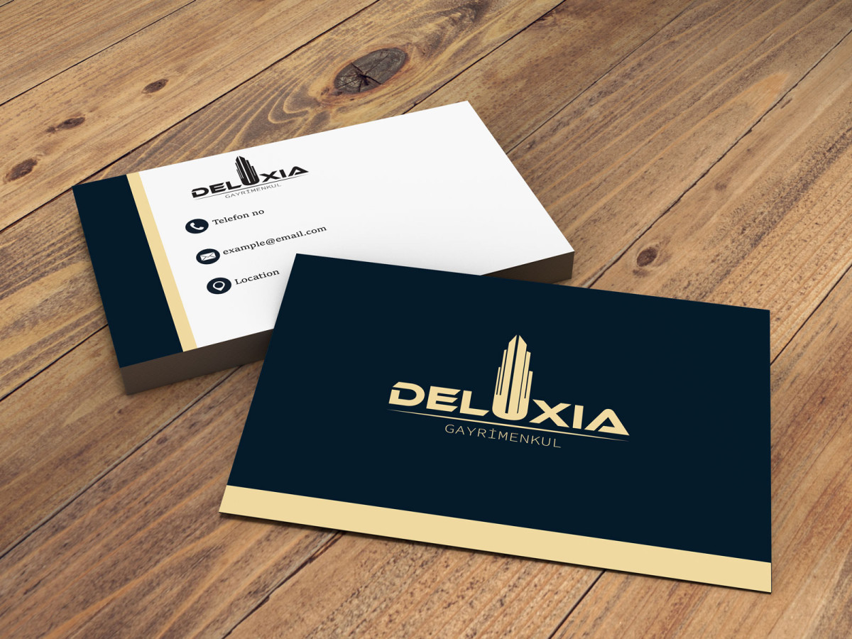 Tasarlayan Pyaah-DELUXIA GAYRİMENKUL KARTVİZİT TASARIMI