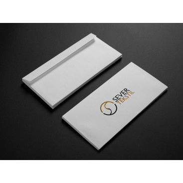 Tekstil firma logosu yarışmasına tasarımcı SZR Graphic Design tarafından sunulan  tasarım 