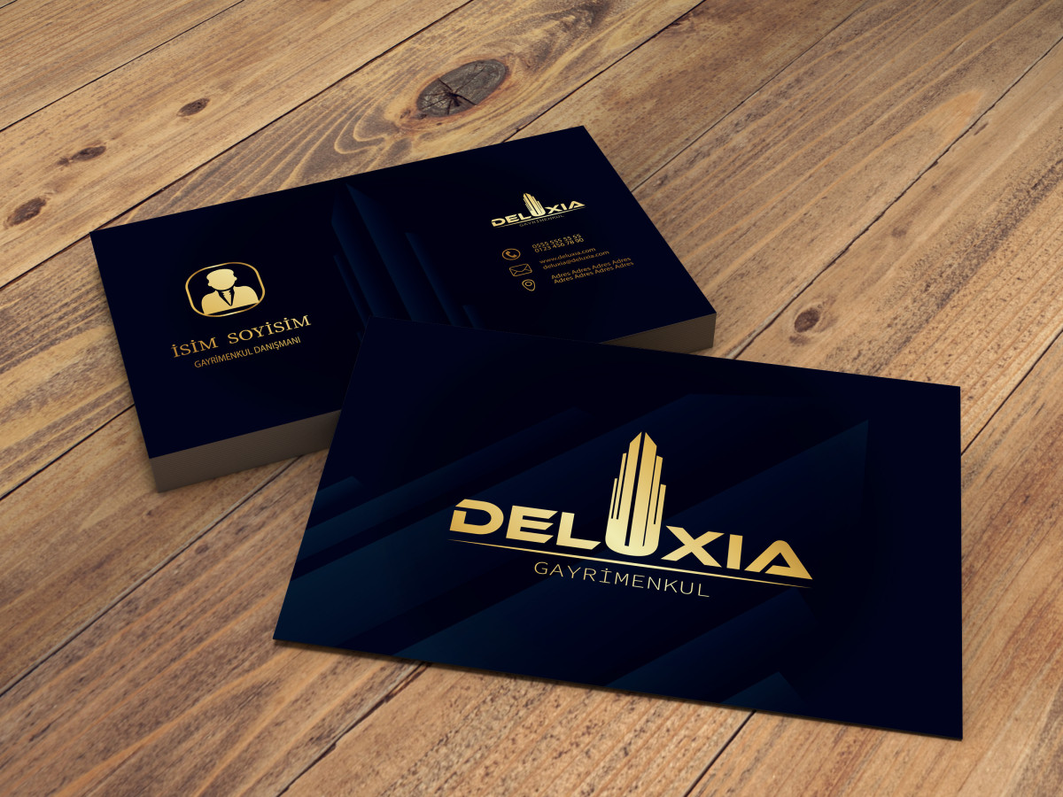 Tasarlayan DesigNero-DELUXIA GAYRİMENKUL KARTVİZİT TASARIMI