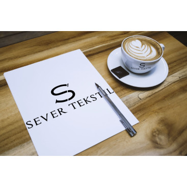 Tekstil firma logosu yarışmasına tasarımcı igrafik tarafından sunulan  tasarım 