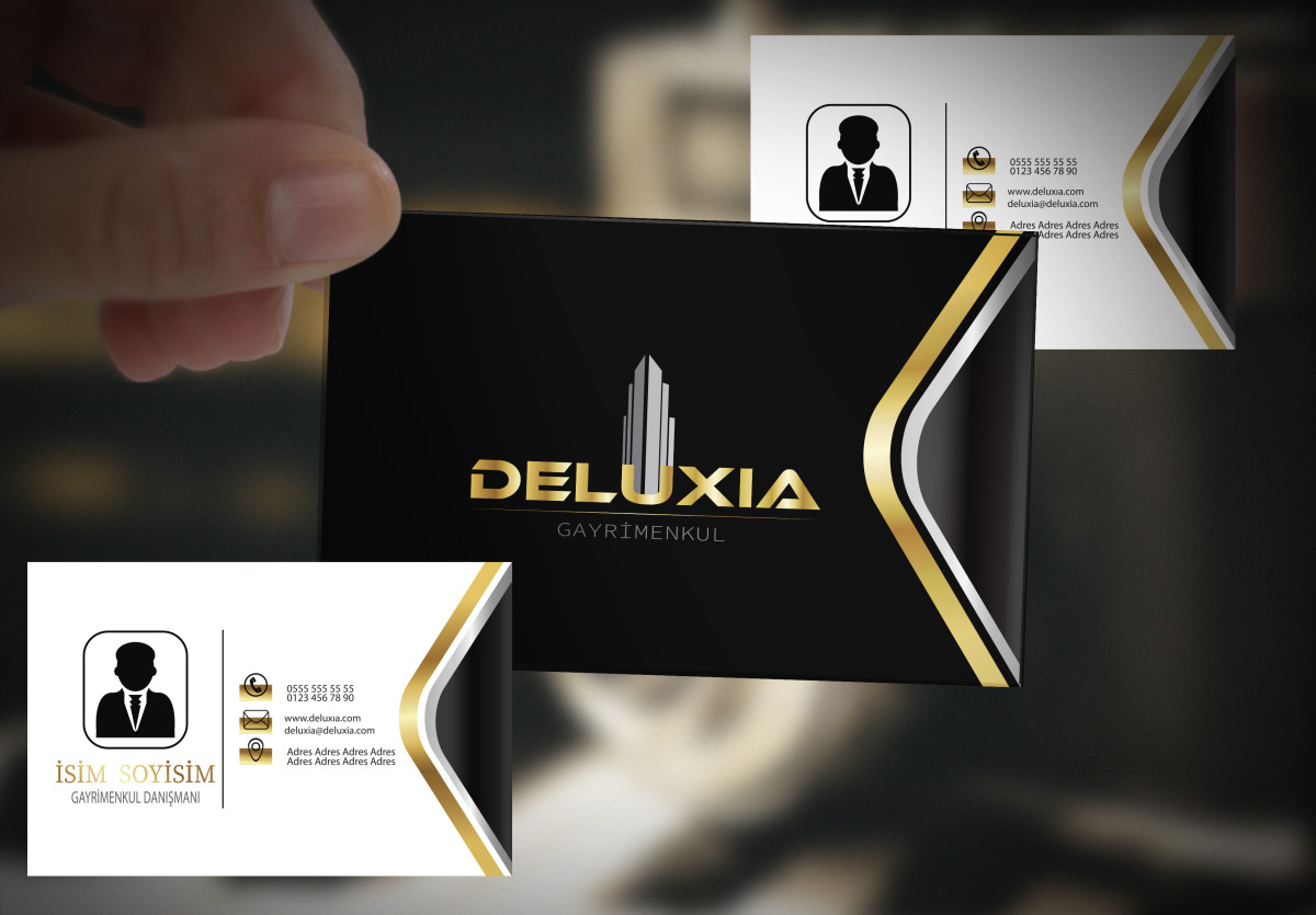 Tasarlayan DesigNero-DELUXIA GAYRİMENKUL KARTVİZİT TASARIMI