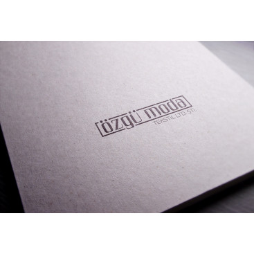 Özgü moda logo tasarım yarışmasına tasarımcı cyasinsengul tarafından sunulan  tasarım 