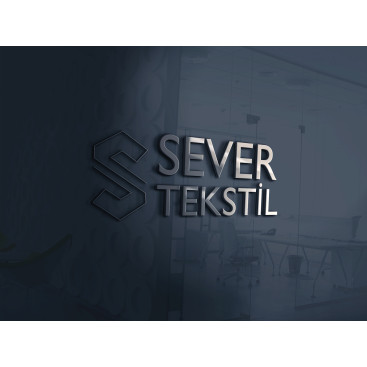 Tekstil firma logosu yarışmasına tasarımcı SZR Graphic Design tarafından sunulan  tasarım 