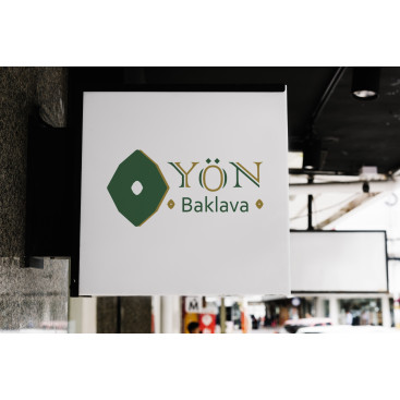 Yön Baklava şirketimiz için sade ve şık yarışmasına tasarımcı Kevser Tekten tarafından sunulan  tasarım