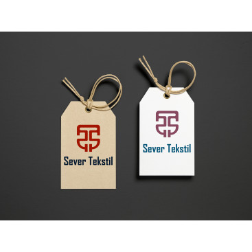 Tekstil firma logosu yarışmasına tasarımcı Mertozgnc tarafından sunulan  tasarım 