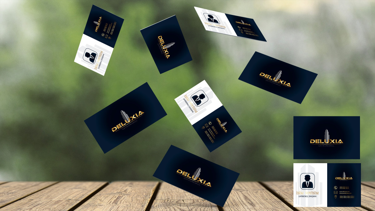 Tasarlayan DesigNero-DELUXIA GAYRİMENKUL KARTVİZİT TASARIMI