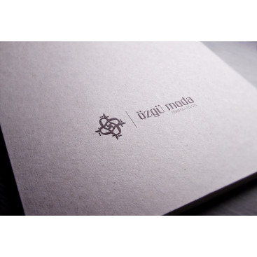 Özgü moda logo tasarım yarışmasına tasarımcı cyasinsengul tarafından sunulan  tasarım 